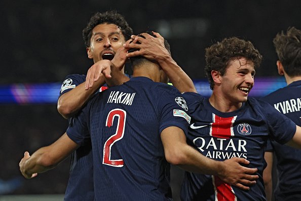 Les joueurs du PSG célèbrent après le match contre Arsenal