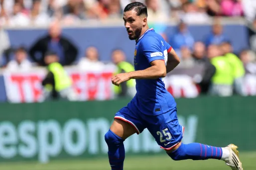 Rayan Cherki lors d'une rencontre avec l'équipe de France