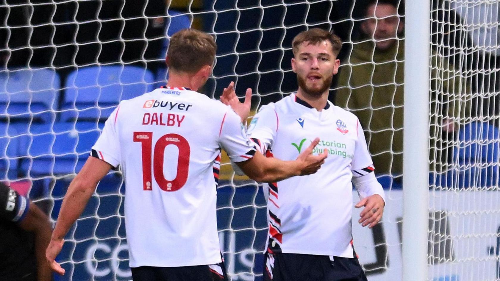 Bolton Wanderers célèbrent un but contre Manchester City U21