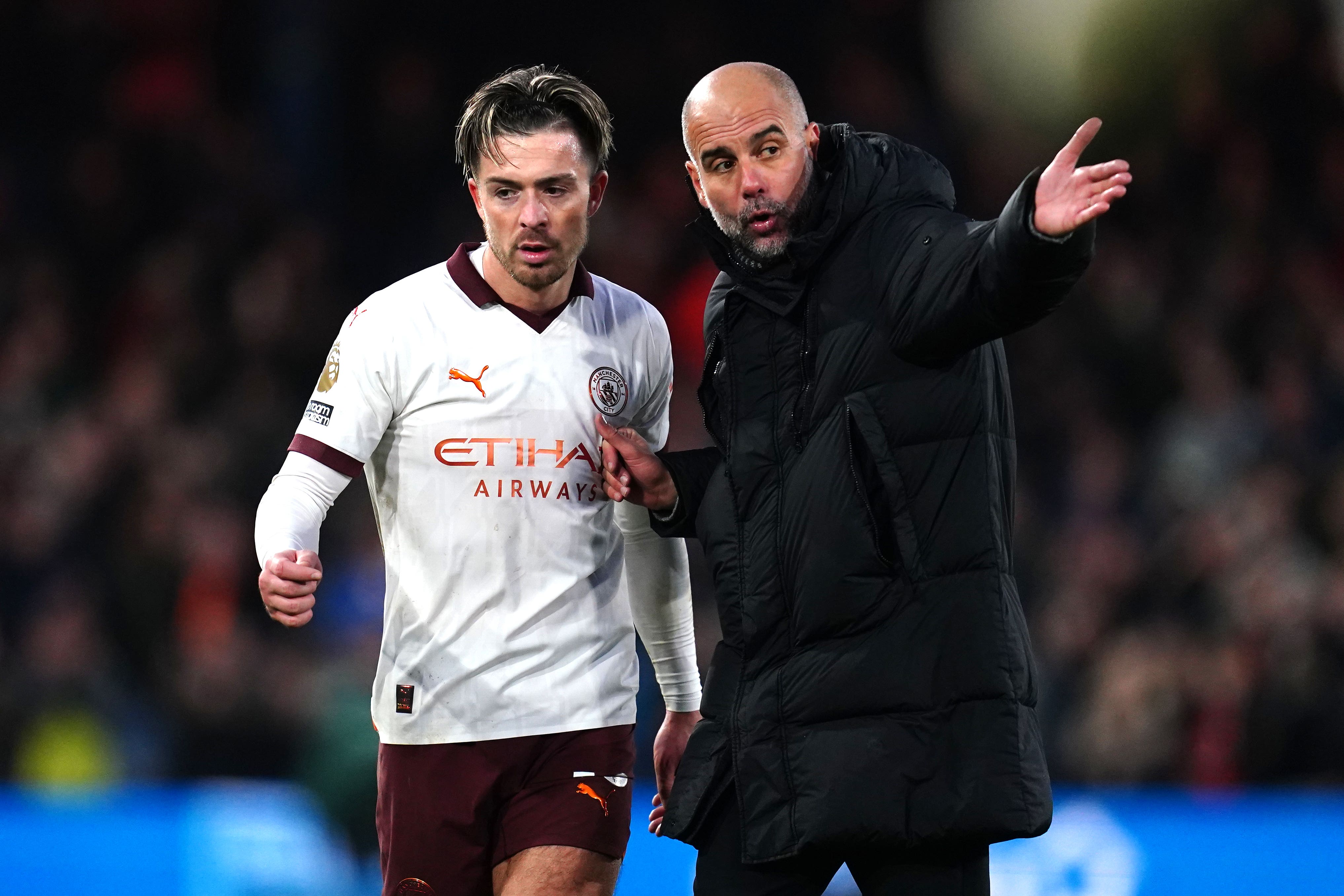 Pep Guardiola et Jack Grealish